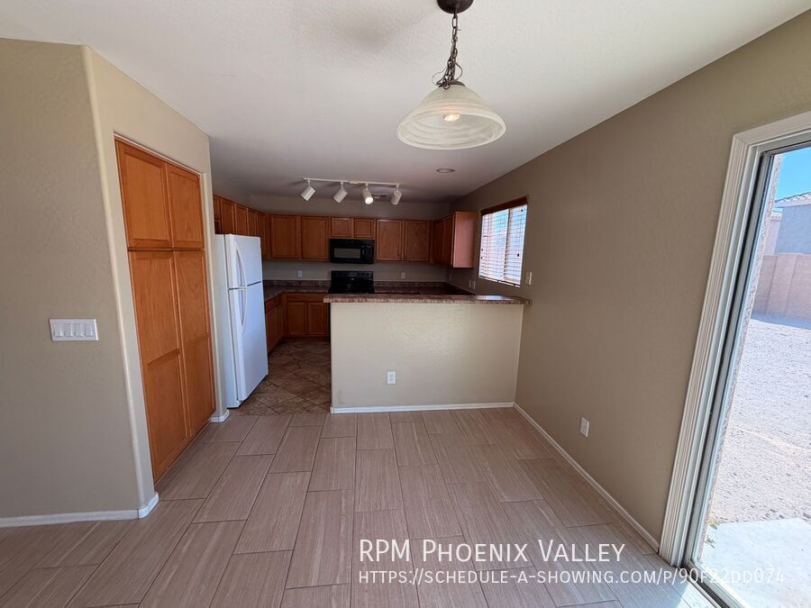 Updated 4x2 Buckeye Home *NO* Carpet & Downstairs Primary Bed! property image