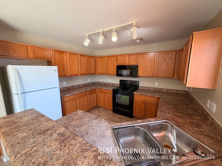 Updated 4x2 Buckeye Home *NO* Carpet & Downstairs Primary Bed! property image