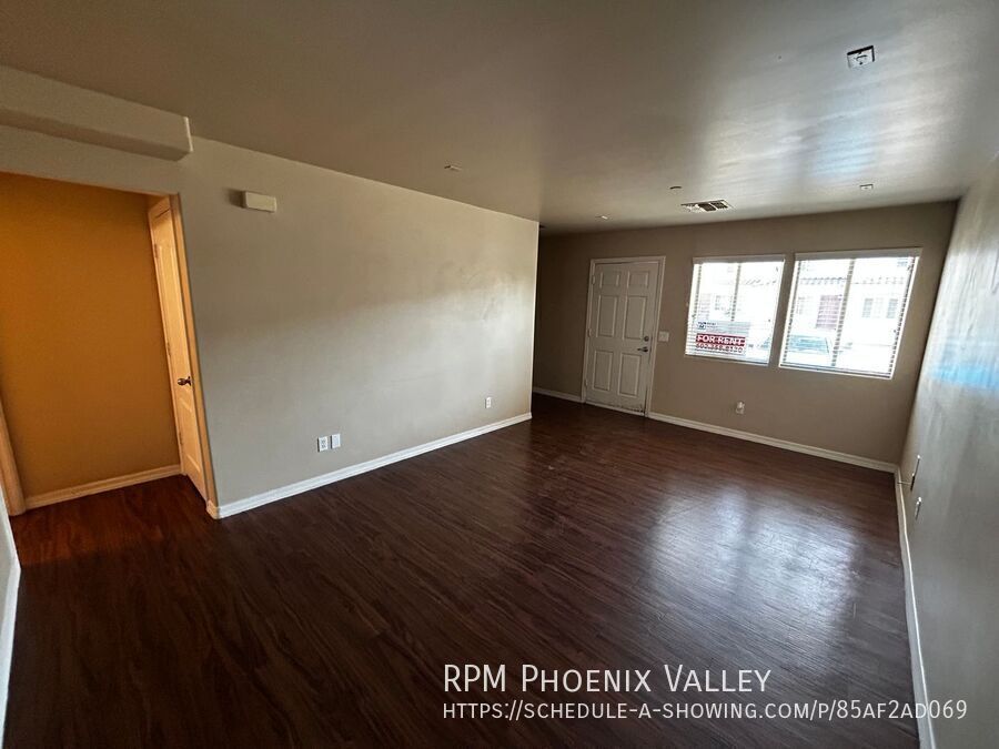 Inviting Townhome with Wood Plank Floors & Private Outdoor Space! Available for showings and move in 8/19/2026. property image