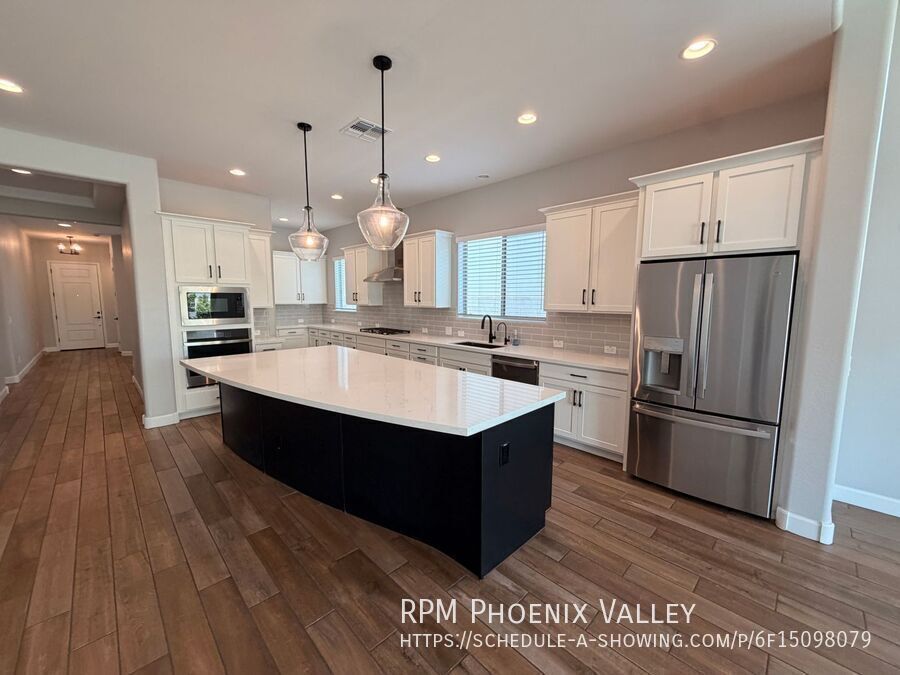 Stunning Luxury 4-Bedroom Home | 2,600+ Sq Ft | Modern Finishes & Private Turf Backyard property image