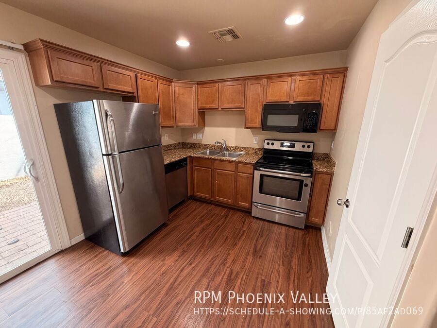 Townhome with Wood Plank Floors & Private Enclosed Outdoor Space! property image